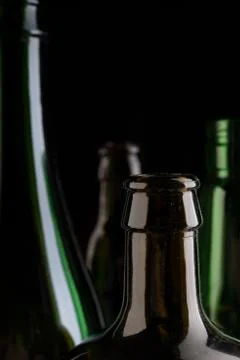Many bottles on black background studio shot Foto stock