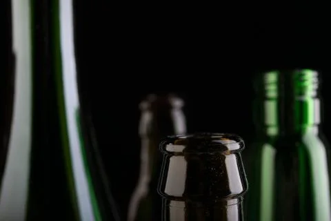 Many bottles on black background studio shot Foto stock