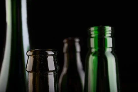 Many bottles on black background studio shot 스톡 사진