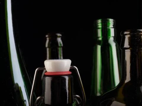 Many bottles on black background studio shot Stock Photos