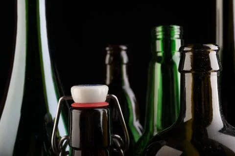 Many bottles on black background studio shot Foto stock