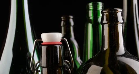 Many bottles on black background studio shot 스톡 사진