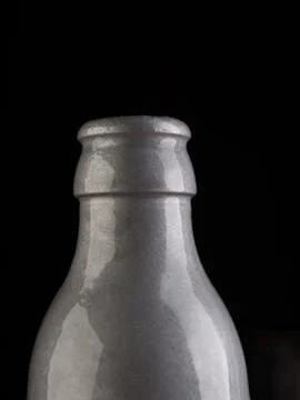Many bottles on black background studio shot Stock Photos