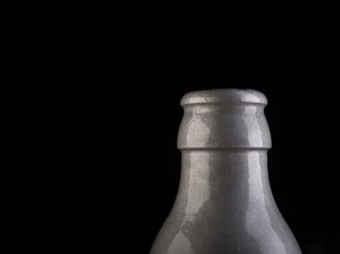 Many bottles on black background studio shot 스톡 사진