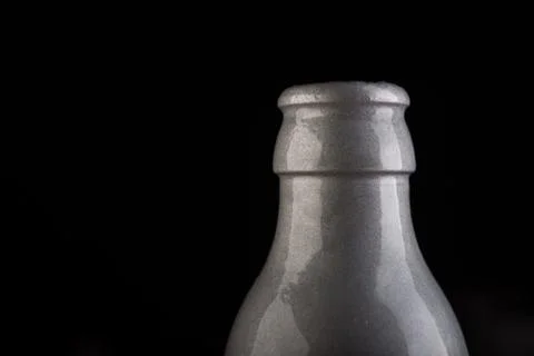 Many bottles on black background studio shot Foto stock