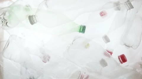 Many bottles transparent plastic PET recycling waste. Empty plastic bottles Stock Footage 174393284