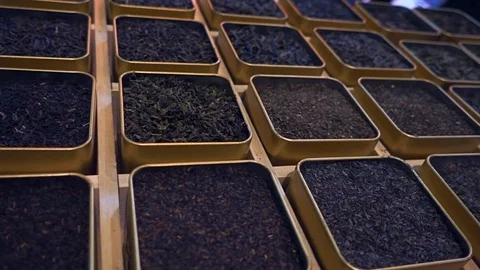 Many boxes of black, green, fruit and other teas in store Stock Footage 71652068