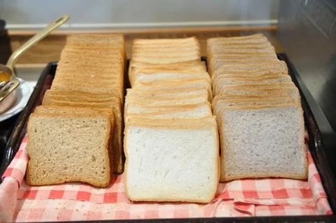 Many bread type on red napery Stock Photos