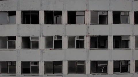 Many broken windows of an apartment building Stock Footage 150363459