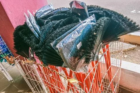 Many brooms Stock Photos