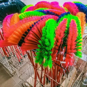 Many brooms Stock Photos