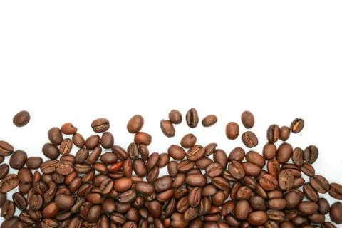 Many brown roasted coffee beans background Stock Photos