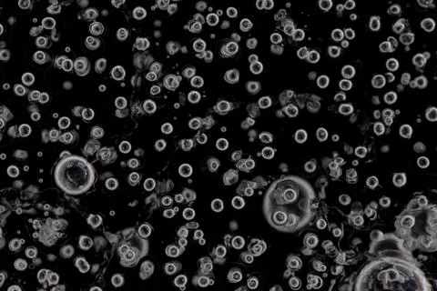 Many bubbles inside the natural ice Stock Photos