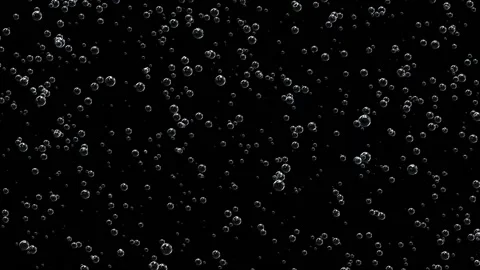 Many bubbles of sparkling water on a black background. Stock Footage 144545321