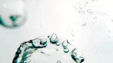 Many Bubbles Surfacing Vertically Against an Overcast Sky. Stock-Footage 49900177