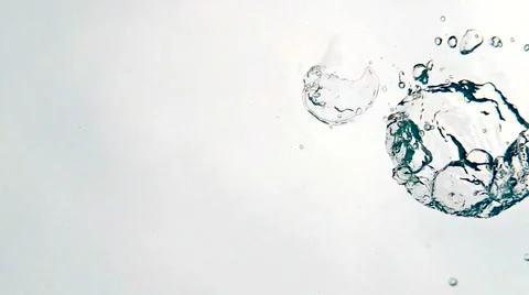 Many Bubbles Surfacing Vertically Against an Overcast Sky. Video stock 49928856