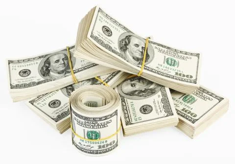 Many  bundle and roll of us 100 dollars bank notes Stock Photos