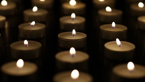 Many burning candles. Many burning candles with shallow depth of field Stock Footage 224105379