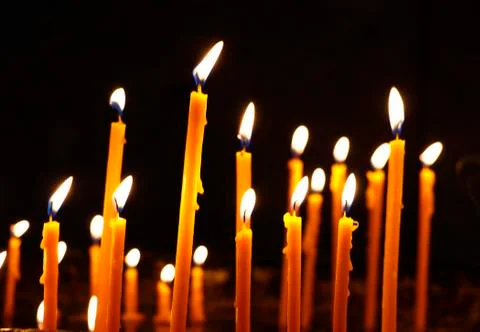 Many burning candles Stock Photos