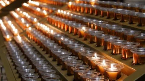 Many burning candles with shallow depth of field Stock Photos