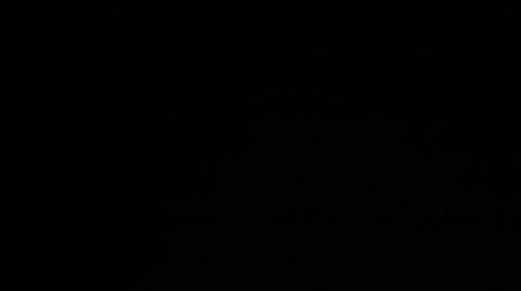 Many candles on a black Stock Footage 61787864