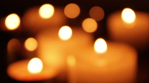 Many candles burning in a dark Stock Footage 47255441