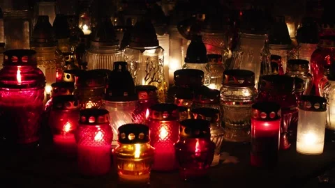 Many candles burning on the grave. Video stock 233970379