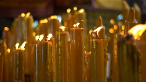 Many candles in a temple with shallow depth - religious theme Stock Footage 71392332