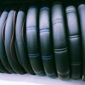 Many car steering wheel covers Stock Photos