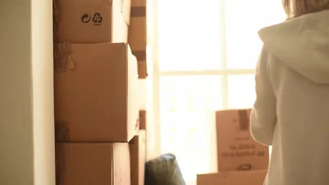Many cardboard boxes are stacked on top of each other. Stock Footage 243170458