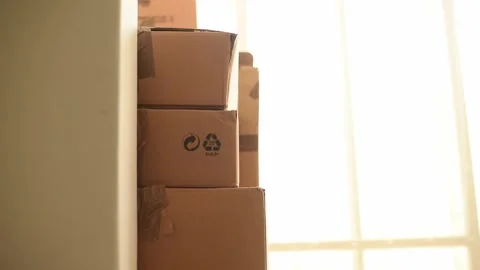 Many cardboard boxes are stacked on top of each other. Stock Footage 243170484