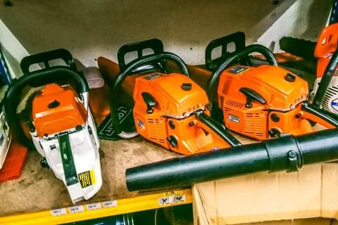 Many chain saws Stock Photos