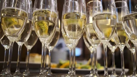 Many champagne glasses on the table during the banquet Stock Footage 123426957