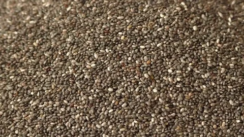 Many chia seeds falling Stock Footage 71093974