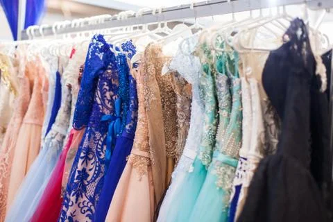 Many chic evening dresses. Stock Photos