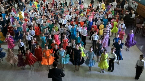 Many children dance flash mobs at ballroom dances. Stock Footage 128260613