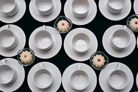 Many coffee cups lined up and ready to receive guests Stock Photos
