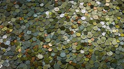 Many coins of different countries rotate as the background. Stock Footage 59878648