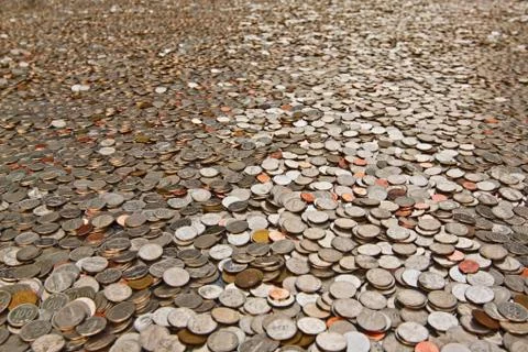 Many coins Stock-Fotos