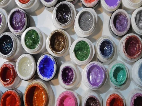 Many colored test samples of nail gel. Closeup. Stock Footage 73397828