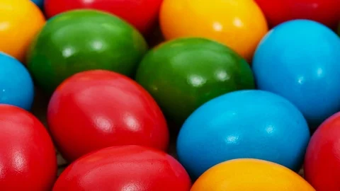Many colorful easter eggs on the table - closeup Видео 72716387