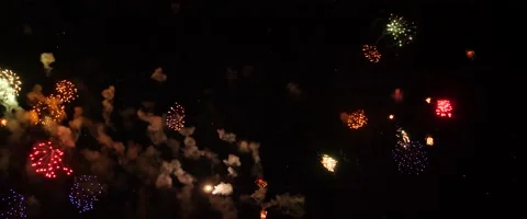 Many Colorful Fireworks Exploding in Large Display - Anamorphic Video stock 157250771