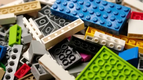 Many colorful multi-colored pieces of constructor. Stock Footage 163658722