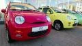 Many-coloured cars Chery QQ at motor show HD Footage