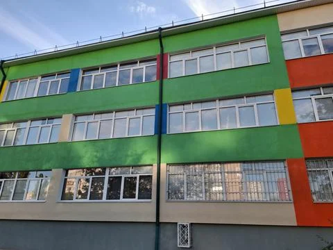 Many-coloured facade of school building 스톡 사진
