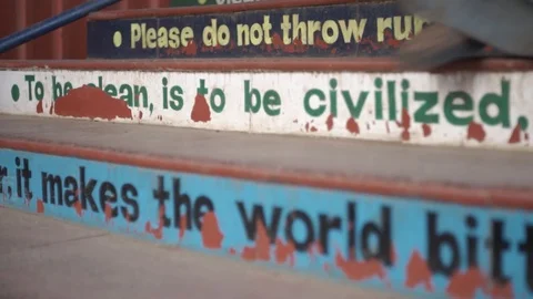 Many colourful ecological statements painted on staircase. Stock Footage 106375788
