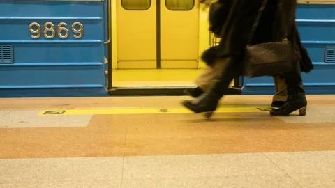 Many commuters low angle perceptive legs departing metro Stock Footage 160237581