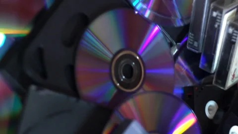 A many compact discs and some hi-8, vhs and dv-cam video casettes Stock Footage 203821658