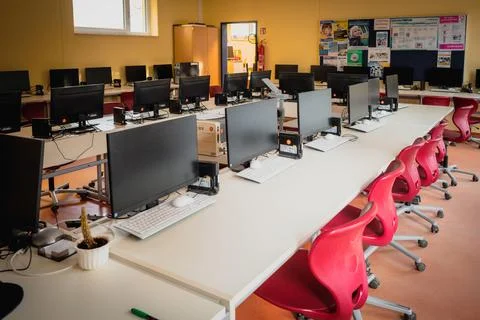 Many computers are in a computer cabinet in a school Stock Photos