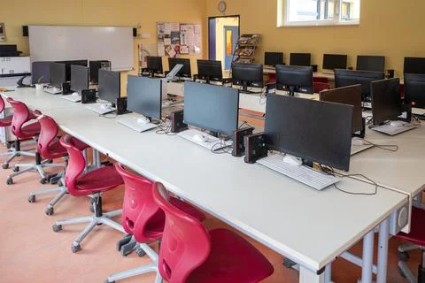 Many computers are in a computer cabinet in a school Stock Photos